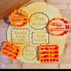 Offensive cookie cutters "I hope you choke, stop talking, kindly f* off, go die"